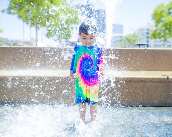 child in fountain