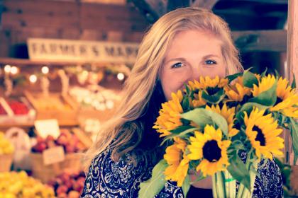 Happiness - woman with sunflowers
